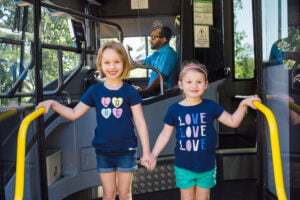 Kids Standing In The Bus